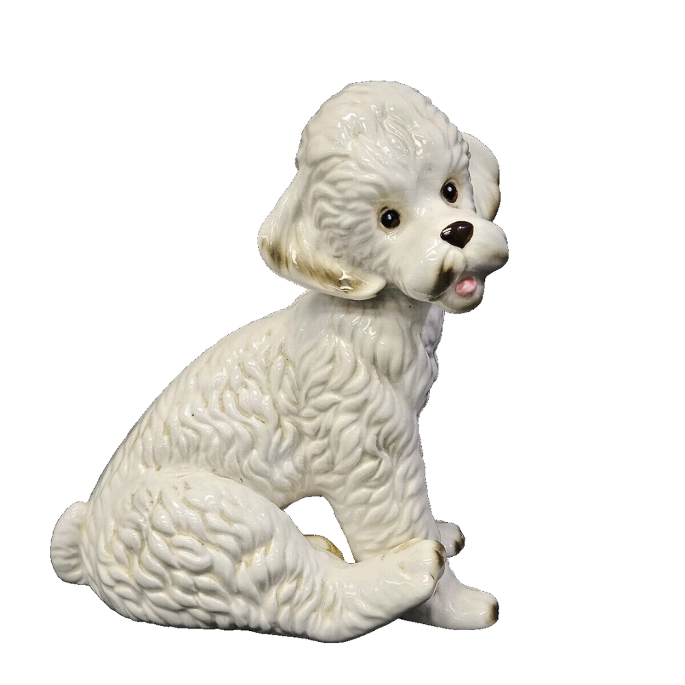 Vintage Porcelain Sitting Poodle.. Figurine
